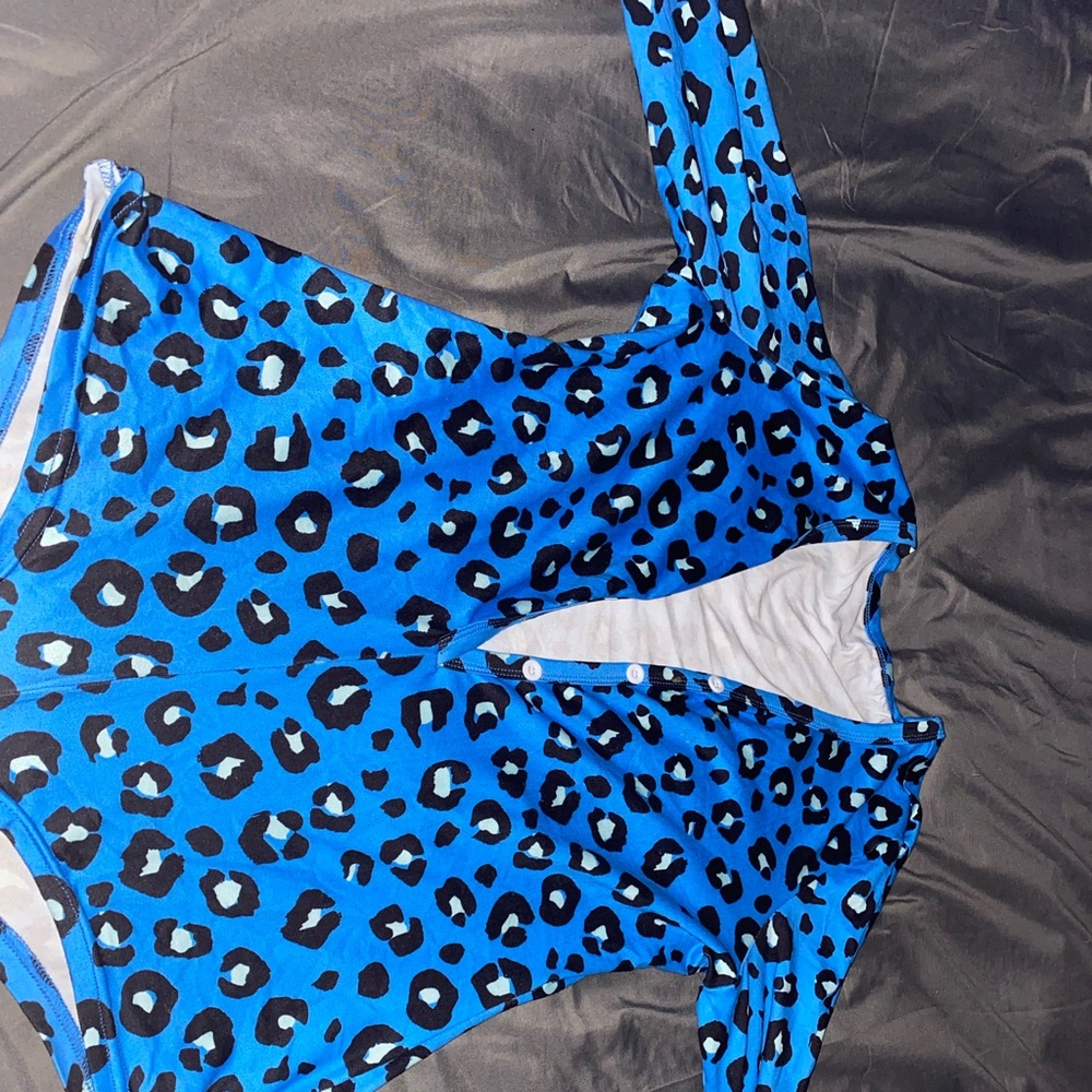 Cheetah print ! It’s a large but fits like a small ! Worn 2 times